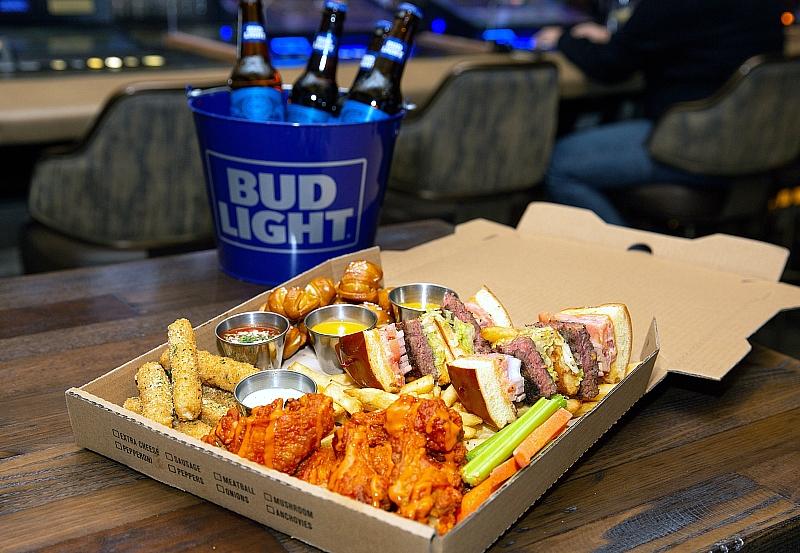 Go Bottoms Up on “Beer Game Sunday” with Party Packs and Beer Buckets at PT’s Taverns