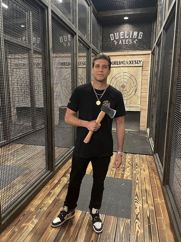 Brian Ortega poses for a photo at Dueling Axes located inside AREA15 (photo credit: Ava Rose Agency)