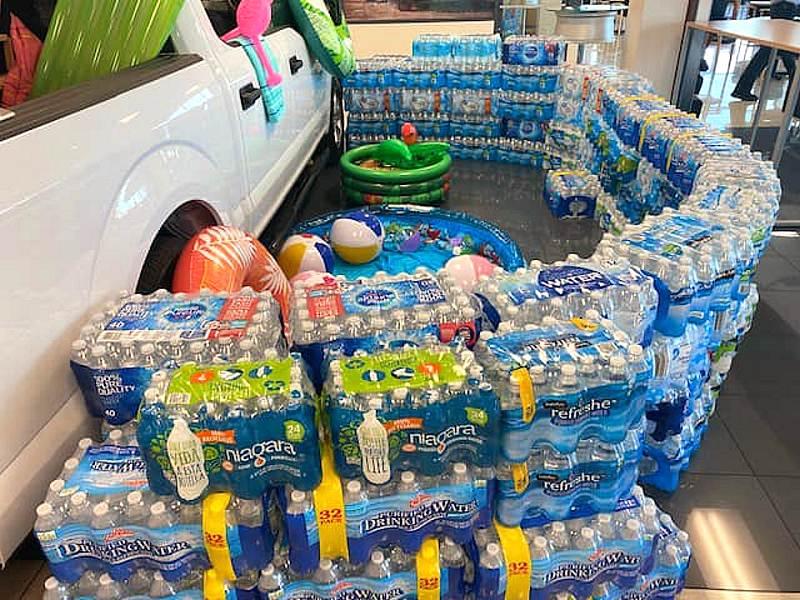 Ford dealerships collected cases of water to support The Salvation Army 