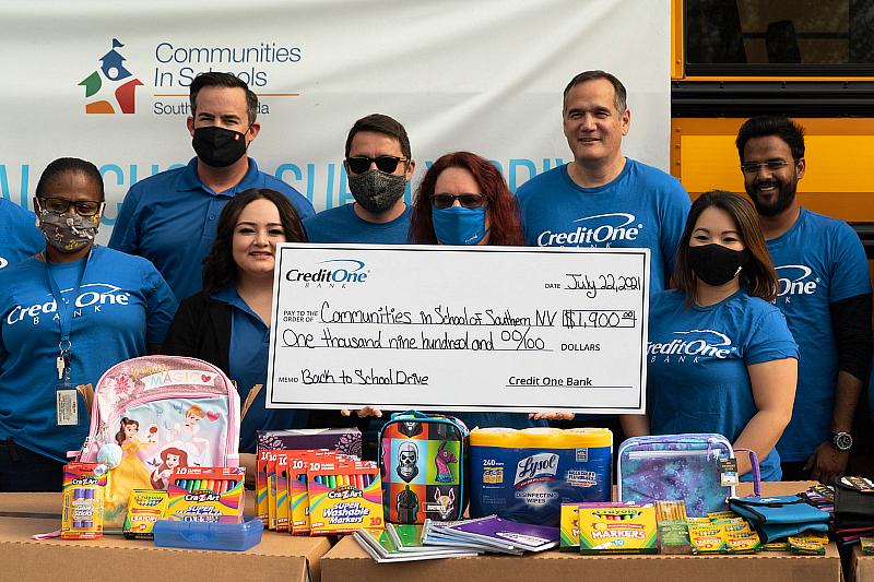  Credit One Bank presents Communities In Schools of Southern Nevada a check for $1,900 