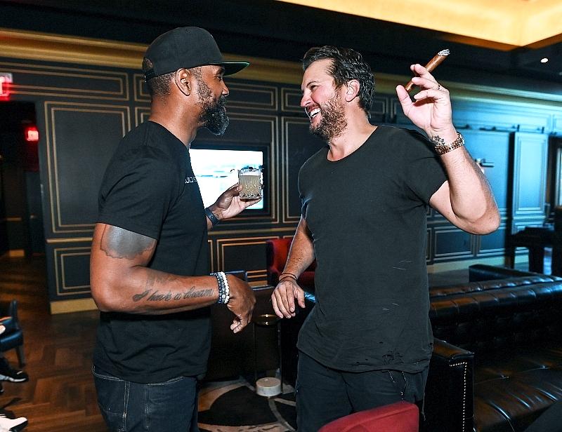 Eight Lounge - Charles Woodson and Luke Bryan - Photo credit: Toby Acuna
