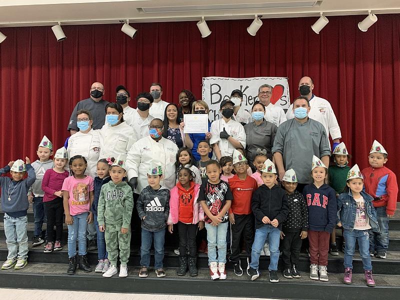 Chefs with students and teachers at Kermit R. Booker ES. 