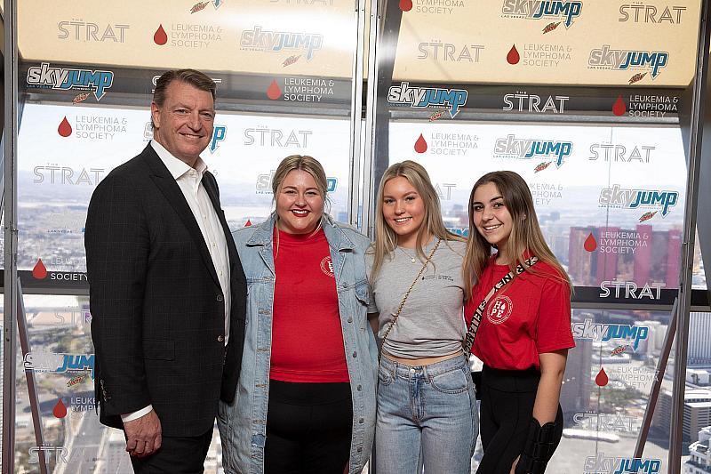 Stephen Thayer, vice president and general manager of The STRAT, and Allie Amato, Kailee Olliges and Gillian Rodophele of Students of the Year pose at SkyJump for a Cure event
