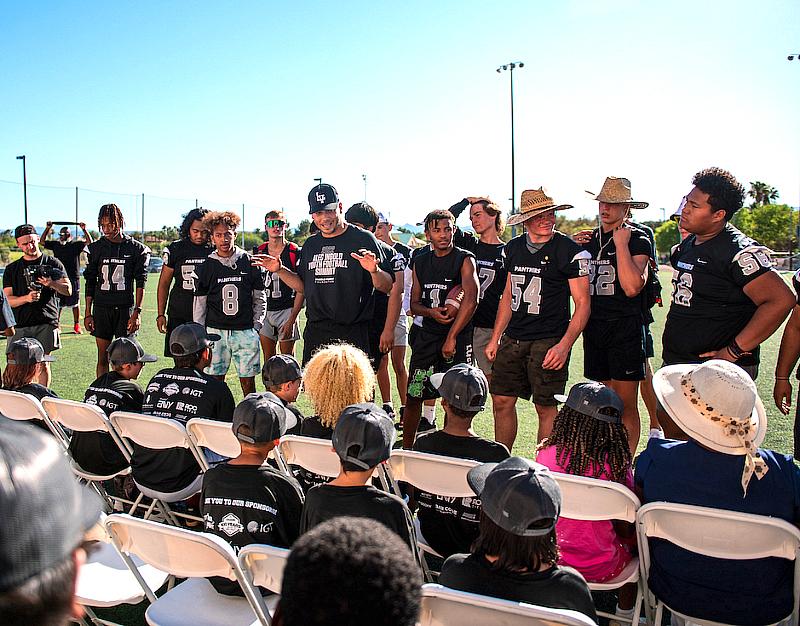 Alec Ingold greets local Las Vegas foster youth at 2022 Alec Ingold Youth Football Summit (Photo Credit: Jeffery Bennett Photography)