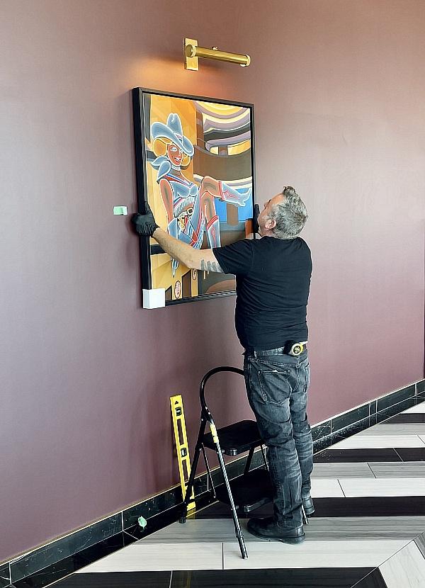 Jason “Borbay” Borbet hangs NFT portrait of the iconic kicking cowgirl neon sign, Vegas Vickie