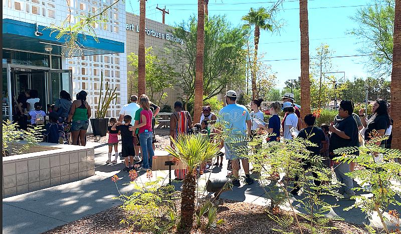 Lines of people wrapped around the block today, July 16, 2022, at The LGBTQ Center of Southern Nevada's annual Back to School Bounty Fair. 
