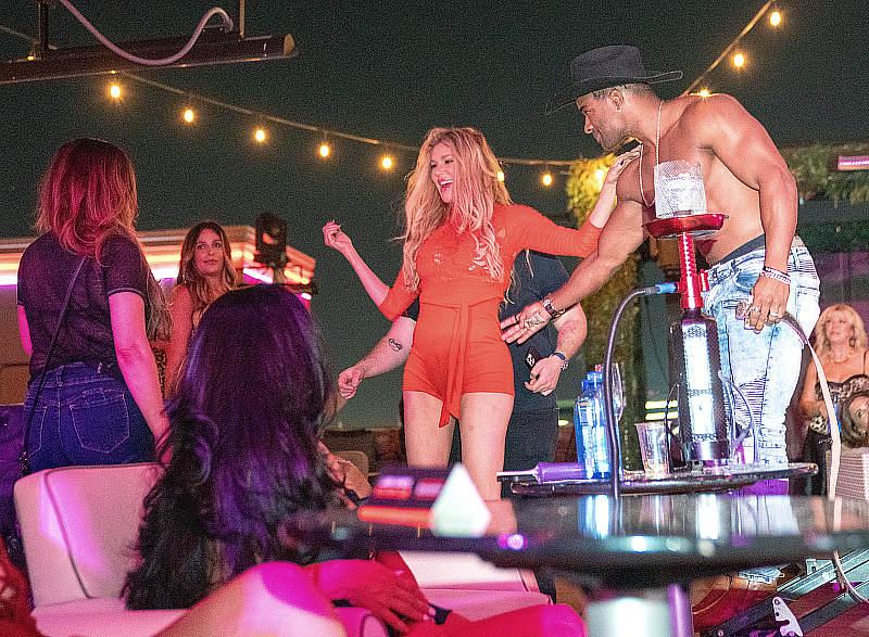 Brandi Glanville appeared disheveled as she was being escorted off the stage by a male entertainer at the Kings of Hustler Male Revue in Las Vegas (photo credit: Jayson Swann)