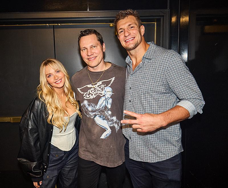 Gronk and girlfriend with resident DJ Tiësto (C)