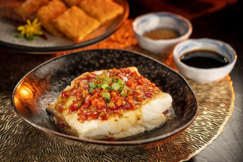 Steamed Sea Bass with Chopped Red Chili (Brown Sugar Sticky Rice Cake side) (Credit The Venetian Resort Las Vegas)