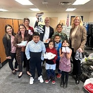SAHARA Las Vegas Team Members Surprise Robert E. Lake Elementary School Students with 350 New Pairs of Shoes