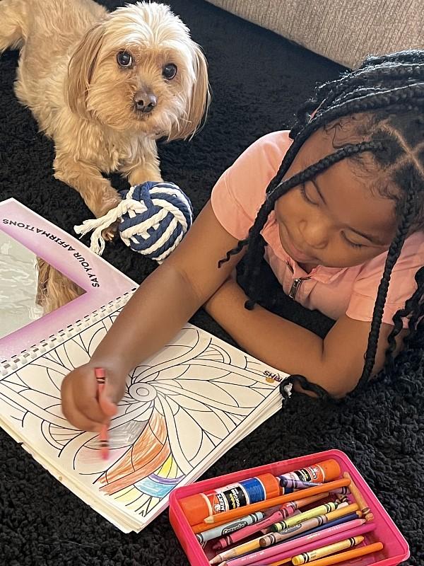 Child and dog with Youth and Adult Therapeutic Coloring Book