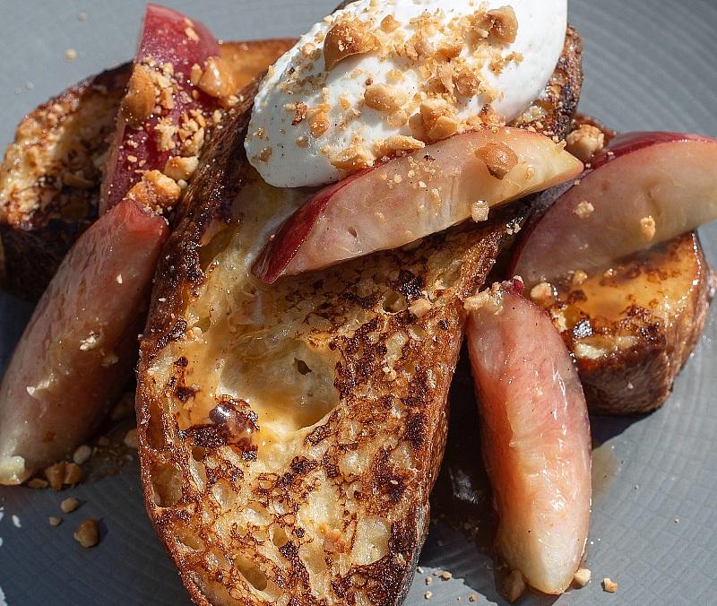 1228 Main Peaches & Cream French Toast, frogs hollow peaches, toasted hazelnuts, vanilla chantilly - Credit Ace Buhay