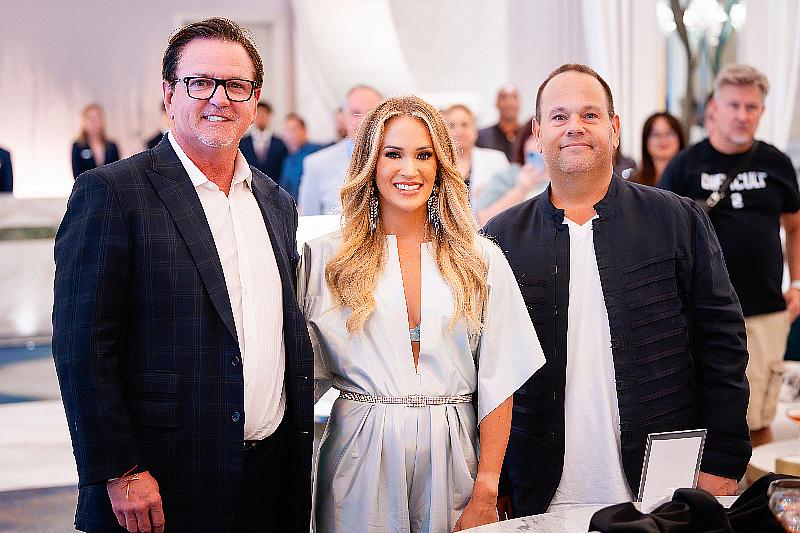 Carrie Underwood was joined by Bobby Reynolds (Senior Vice President, AEG Presents Las Vegas) and Scott Sibella (President, Resorts World Las Vegas).