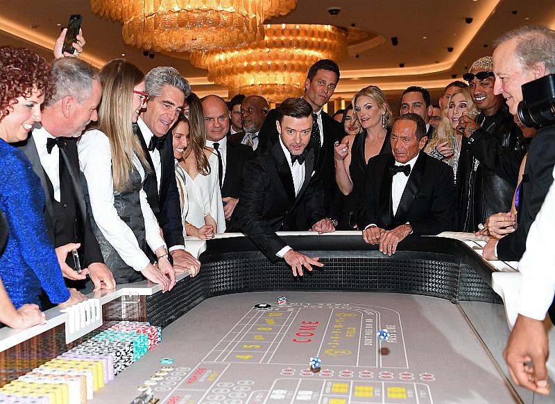 Fontainebleau Development Chairman & CEO Jeffrey Soffer, Justin Timberlake, Tom Brady, Fontainebleau Las Vegas COO Colleen Birch, Paul Anka, Cher, and Alexander "A.E." Edwards play Craps at the Fontainebleau Las Vegas Grand Opening Celebration on December 13, 2023 in Las Vegas (Photo by Denise Truscello/Getty Images)