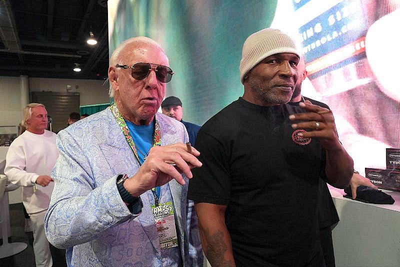Ric Flair and Mike Tyson at CHAMPS 2024 Trade Show at the Las Vegas Convention Center.  