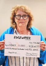 Nancy K. wins $72,265 Double Progressive Bingo jackpot at Edgewater Casino Resort_courtesy Golden Entertainment